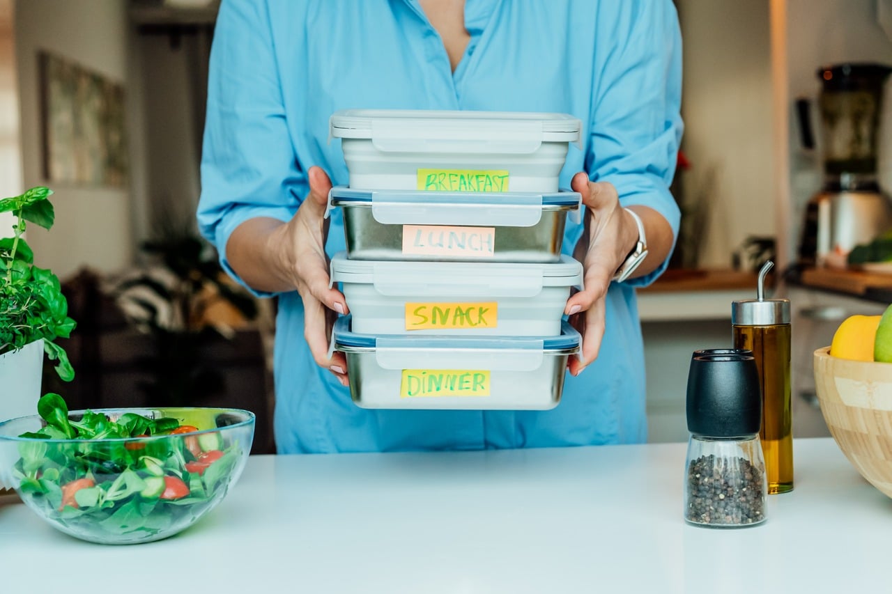 Image of packed tiffin boxes with travel snacks